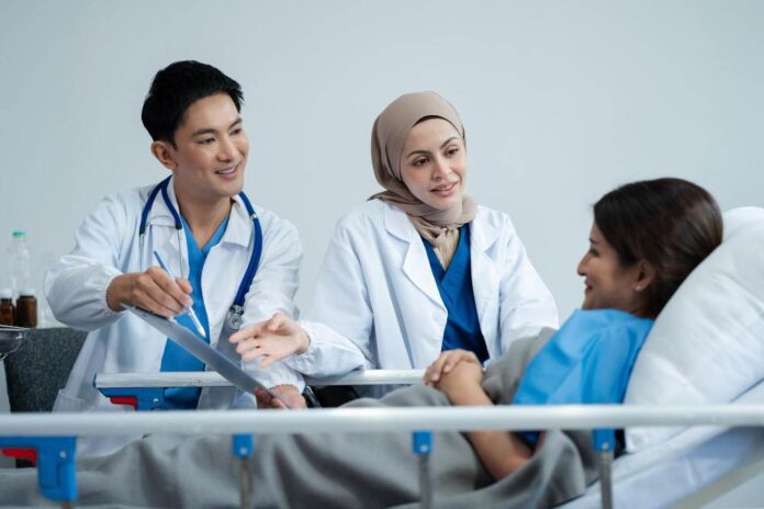 Surgeons visiting a patient